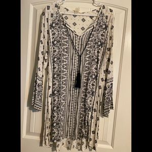 Long sleeve, short dress. In good condition.